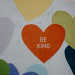 Be kind written inside a heart