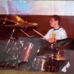 Young Craig playing the drums